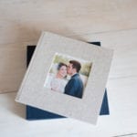 A wedding album with a photo of a bride and groom.